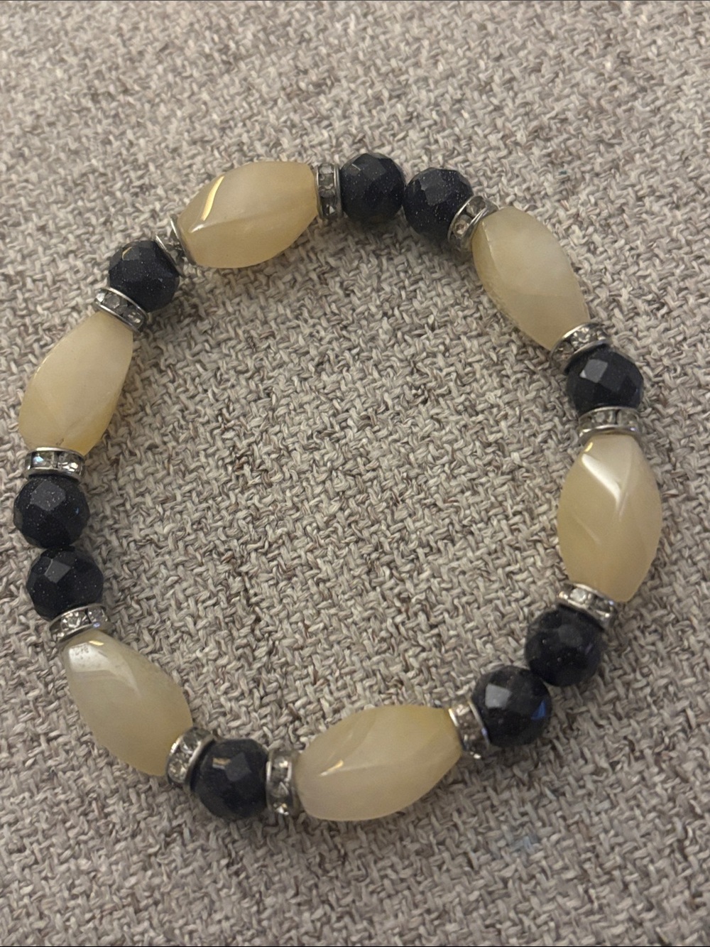 Beige and Black Faceted Bead Stretch Bracelet - Unbranded